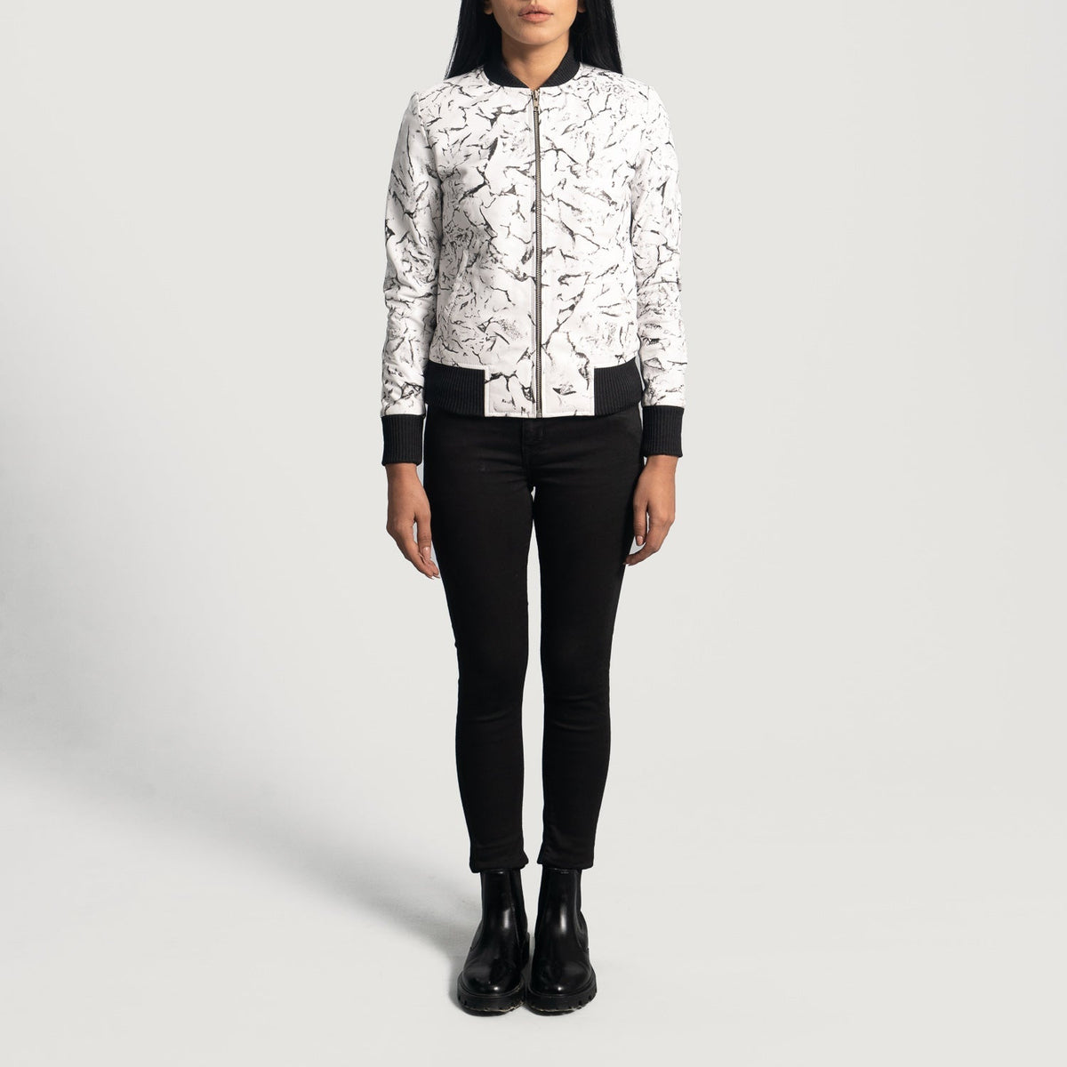 Close-Up Detail of Varsity &amp; Zipper Hardware on Women's Donna Blake White Leather Bomber Jacket