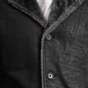 
Крупний план деталей of Notch & Button Hardware on Kolby Distressed Black Shearling Long Coat