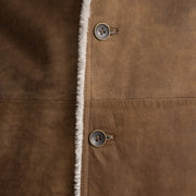 
Крупний план деталей of Notch & Button Hardware on Kolby Distressed Brown Shearling Long Coat