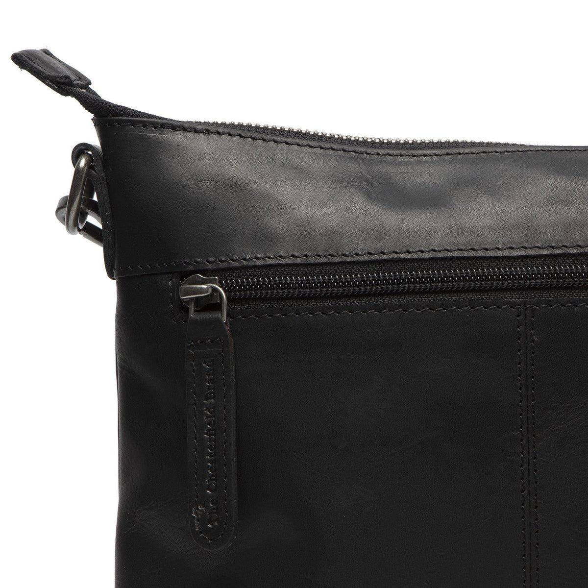 
Solid Antique Brass Hardware & Heavy-Duty Dual Zipper Detail on Faro Шкіряна сумка через плече