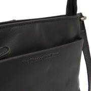 
Solid Antique Brass Hardware & Heavy-Duty Dual Zipper Detail on Salerno Шкіряна сумка через плече