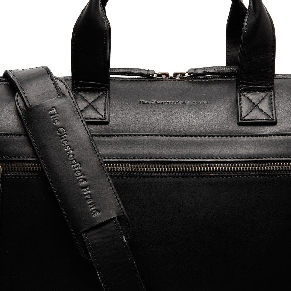 
Solid Antique Brass Hardware & Heavy-Duty Dual Zipper Detail on Levanto Шкіряна сумка для ноутбука