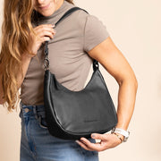 
Classic 100% Full-Grain leather Bag - Вигляд ззаду з посиленими шкіряними ременями та прострочкою