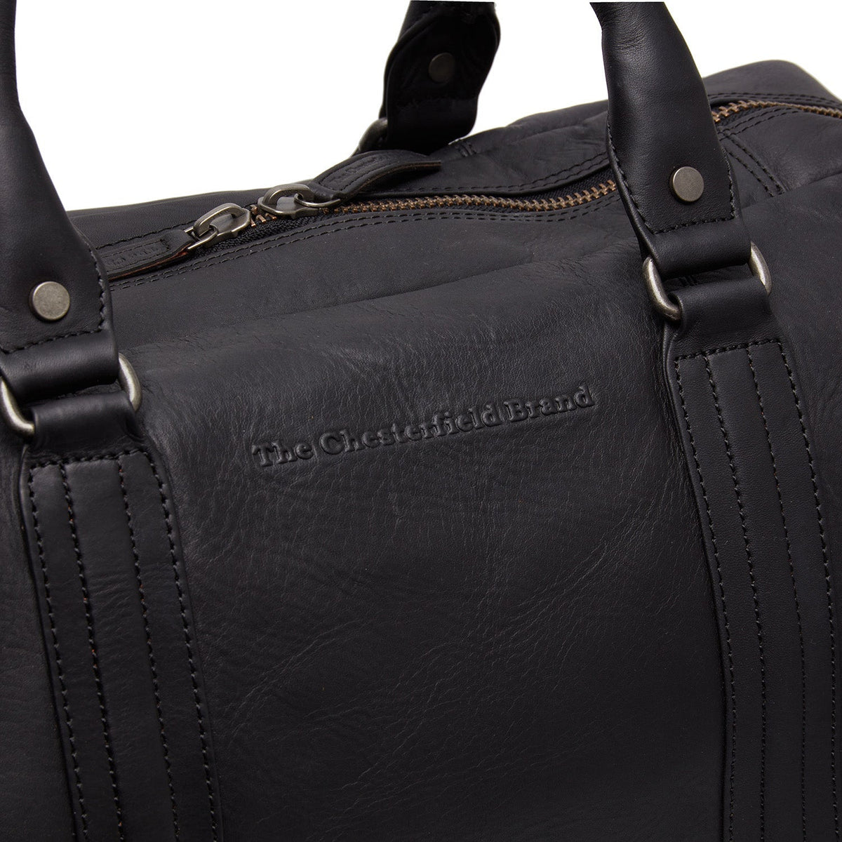 
Solid Antique Brass Hardware & Heavy-Duty Dual Zipper Detail on Perth Шкіряна дорожня сумка