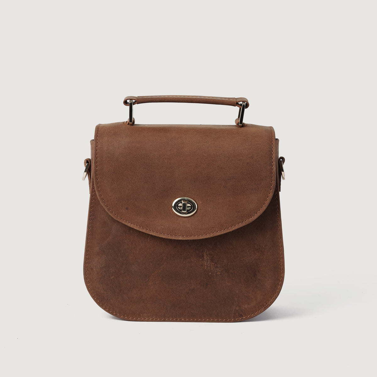 
The Sandra Vintage Рудий Leather Saddle Bag For Women - Бічний профіль із глибиною складок та місткістю