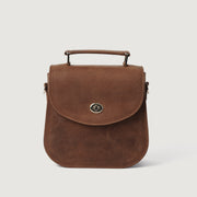 
The Sandra Vintage Рудий Leather Saddle Bag For Women - Бічний профіль із глибиною складок та місткістю