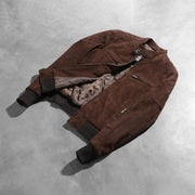 
Як виглядає на людині:  Zenna Mocha Suede Bomber Jacket на моделі — природне спадання при денному світлі